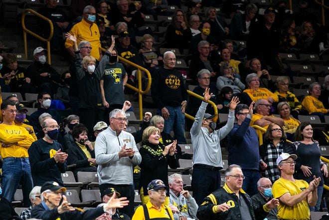 Iowa Hawkeyes fans cheer during a NCAA women's basketball exhibition game against Truman State, Thursday, Nov. 4, 2021, at Carver-Hawkeye Arena in Iowa City, Iowa.