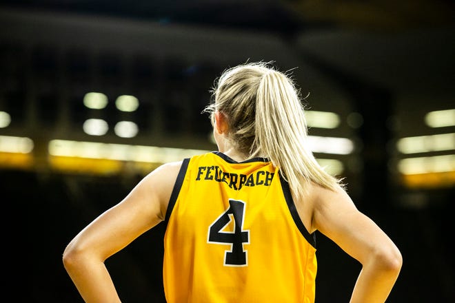 Iowa guard Kylie Feuerbach (4) looks into the crowd during a NCAA women's basketball exhibition game against Truman State, Thursday, Nov. 4, 2021, at Carver-Hawkeye Arena in Iowa City, Iowa.