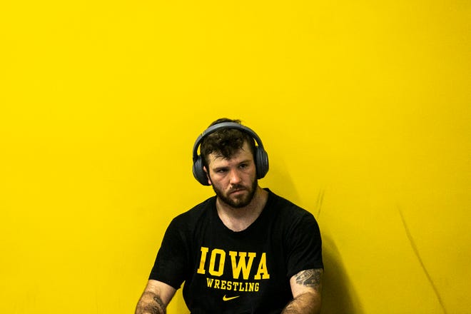 Iowa's Jaydin Eierman listens to music before a NCAA Hawkeyes men's wrestling intrasquad match, Friday, Nov. 5, 2021, at the Dan Gable Wrestling Complex in Carver-Hawkeye Arena in Iowa City, Iowa.