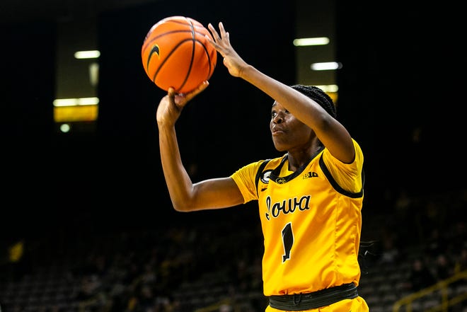 Iowa guard Tomi Taiwo (1) makes a 3-point basket during a NCAA women's basketball exhibition game against Truman State, Thursday, Nov. 4, 2021, at Carver-Hawkeye Arena in Iowa City, Iowa.