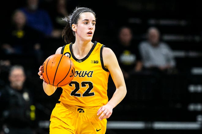 Iowa guard Caitlin Clark (22) takes the ball up court during a NCAA women's basketball exhibition game against Truman State, Thursday, Nov. 4, 2021, at Carver-Hawkeye Arena in Iowa City, Iowa.