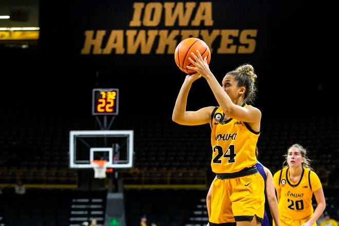 Iowa guard Gabbie Marshall (24) makes a basket during a NCAA women's basketball exhibition game against Truman State, Thursday, Nov. 4, 2021, at Carver-Hawkeye Arena in Iowa City, Iowa.