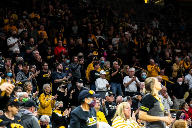 Iowa Hawkeyes fans cheer during a NCAA non-conference women's basketball game against New Hampshire, Tuesday, Nov. 9, 2021, at Carver-Hawkeye Arena in Iowa City, Iowa.