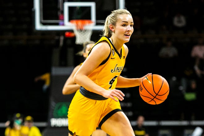 Iowa guard Kylie Feuerbach (4) dribbles the ball up court during a NCAA non-conference women's basketball game against New Hamsphire, Tuesday, Nov. 9, 2021, at Carver-Hawkeye Arena in Iowa City, Iowa.