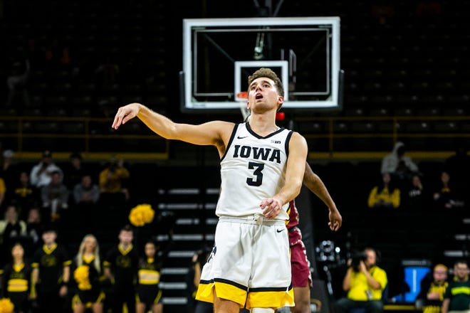 Iowa guard Jordan Bohannon (3) reacts after missing a 3-point basket during a NCAA non-conference men's basketball game against North Carolina Central, Tuesday, Nov. 16, 2021, at Carver-Hawkeye Arena in Iowa City, Iowa.