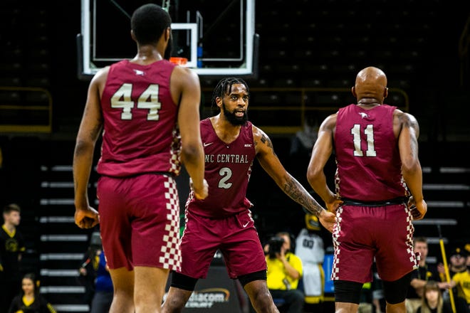 North Carolina Central's Kris Monroe (2) celebrates with teammate Marque Maultsby, right, during a NCAA non-conference men's basketball game against Iowa, Tuesday, Nov. 16, 2021, at Carver-Hawkeye Arena in Iowa City, Iowa.