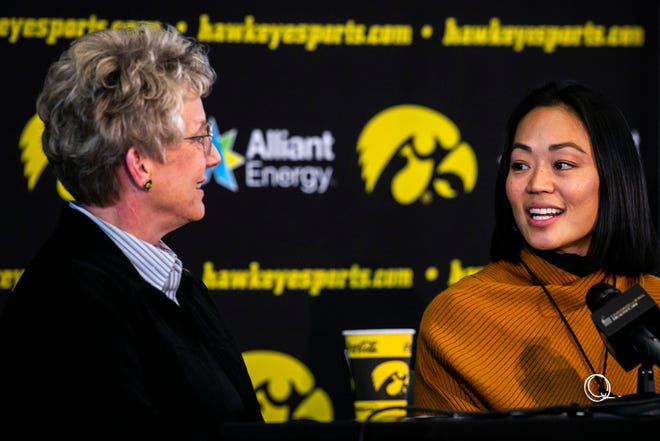 Clarissa Chun, right, thanks Barbara Burke, University of Iowa's deputy director of athletics during a news conference announcing Chun as the inaugural head coach for the women's wrestling program, Friday, Nov. 19, 2021, at Carver-Hawkeye Arena in Iowa City, Iowa.