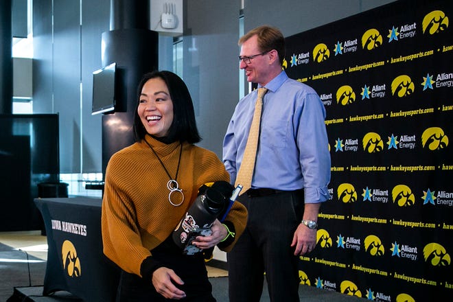 Clarissa Chun smiles after a news conference announcing her as the head coach for the women's wrestling program, Friday, Nov. 19, 2021, at Carver-Hawkeye Arena in Iowa City, Iowa.