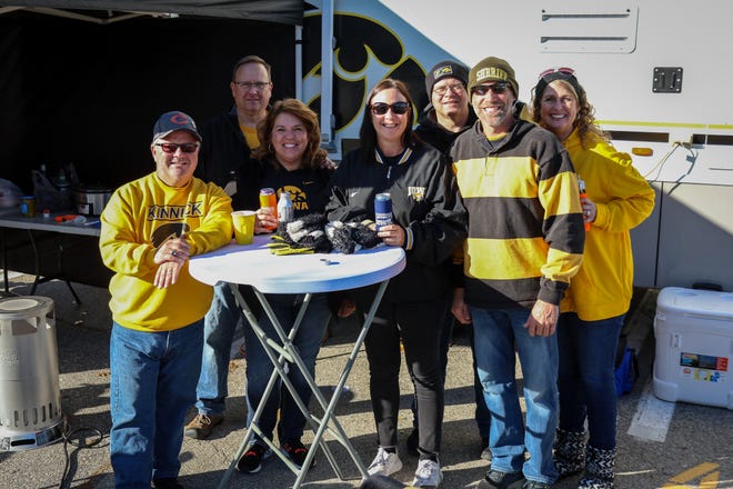 The “Scott County Tailgaters” tailgate before the Iowa football game against Illinois in Iowa City on Sat., Nov. 20, 2021.