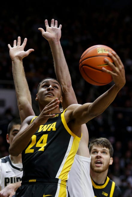 Iowa forward Kris Murray (24) goes up for a shot during the first half of an NCAA men's basketball game, Friday, Dec. 3, 2021 at Mackey Arena in West Lafayette.