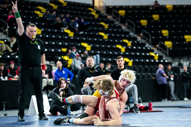 Lockport's Brayden Thompson, top, wrestles Linn-Mar's Tate Naaktgeboren at 170 pounds during the finals of the Dan Gable Donnybrook high school wrestling tournament, Saturday, Dec. 4, 2021, at the Xtream Arena in Coralville, Iowa.