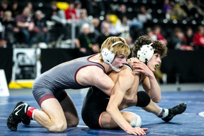 Ankeny's Trever Anderson, left, wrestles DeKalb's Danny Aranda at 120 pounds during the finals of the Dan Gable Donnybrook high school wrestling tournament, Saturday, Dec. 4, 2021, at the Xtream Arena in Coralville, Iowa.