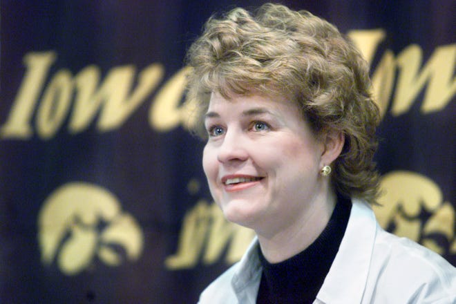 Iowa women's basketball head coach Lisa Bluder smiles as she answers questions at a press conference at Carver-Hawkeye Arena on Tuesday, Feb. 27, 2001 after she was named Big Ten Coach of the Year by her peers and the media.