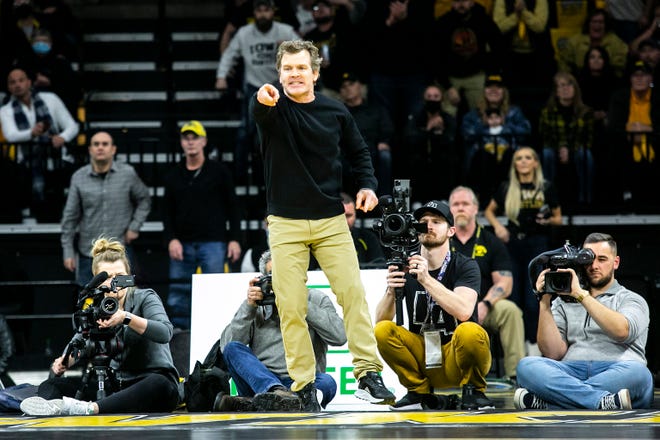Iowa associate head coach Terry Brands reacts during a NCAA Big Ten Conference wrestling dual against Penn State, Friday, Jan. 28, 2022, at Carver-Hawkeye Arena in Iowa City, Iowa.