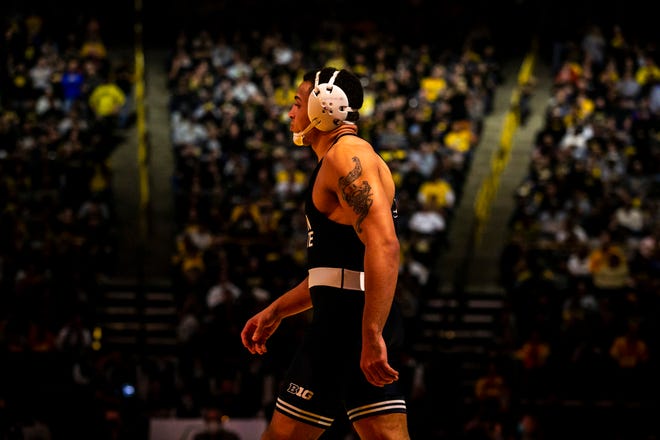 Penn State's Aaron Brooks is introduced before wrestling at 184 pounds during a NCAA Big Ten Conference wrestling dual against Iowa, Friday, Jan. 28, 2022, at Carver-Hawkeye Arena in Iowa City, Iowa.