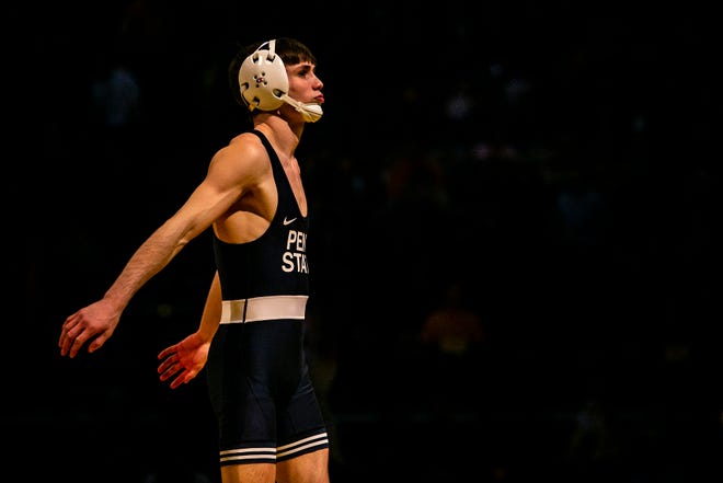 Penn State's Drew Hildebrandt gets ready before wrestling at 125 pounds during a NCAA Big Ten Conference wrestling dual against Iowa, Friday, Jan. 28, 2022, at Carver-Hawkeye Arena in Iowa City, Iowa.