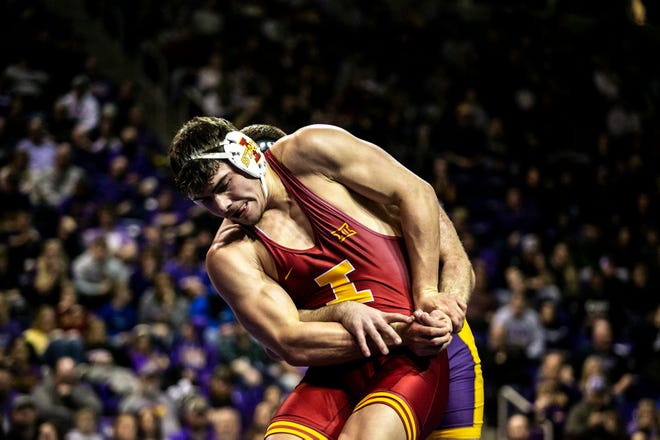 Iowa State's Sam Schuyler, left, works to get an escape while wrestling Northern Iowa's Carter Isley at 285 pounds during a NCAA college Big 12 wrestling dual, Friday, Feb. 11, 2022, at the McLeod Center in Cedar Falls, Iowa.