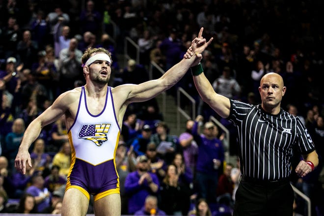 Northern Iowa's Austin Yant had his hand raised after scoring a decision at 165 pounds during a NCAA college Big 12 wrestling dual against Iowa State, Friday, Feb. 11, 2022, at the McLeod Center in Cedar Falls, Iowa.