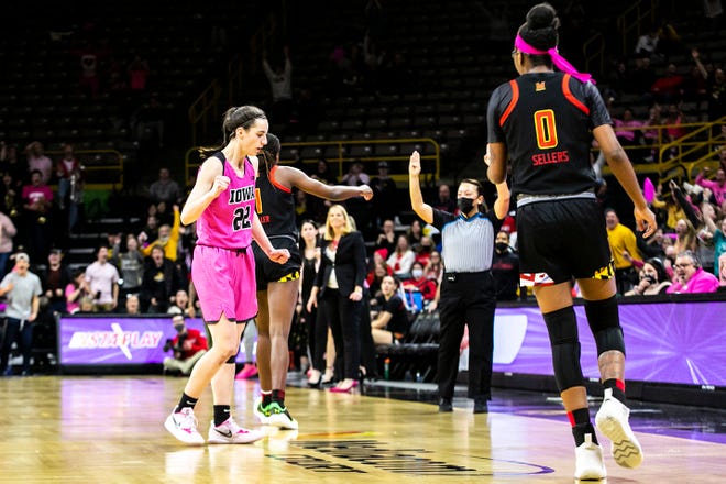Iowa guard Caitlin Clark (22) reacts after making a 3-point basket during a NCAA Big Ten Conference women's basketball game against Maryland, Monday, Feb. 14, 2022, at Carver-Hawkeye Arena in Iowa City, Iowa.