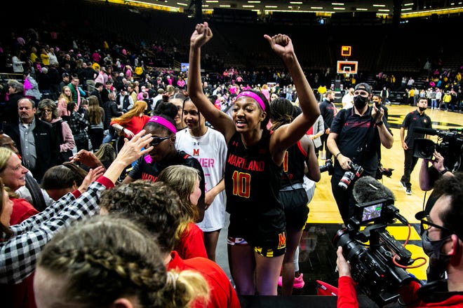 Maryland's Angel Reese (10) and teammates celebrate after a NCAA Big Ten Conference women's basketball game against Iowa, Monday, Feb. 14, 2022, at Carver-Hawkeye Arena in Iowa City, Iowa.
