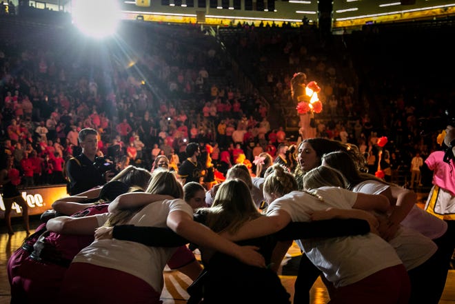 Iowa Hawkeyes players huddle up before a NCAA Big Ten Conference women's basketball game against Maryland, Monday, Feb. 14, 2022, at Carver-Hawkeye Arena in Iowa City, Iowa.