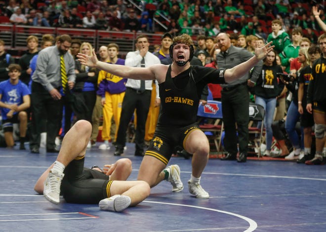 Waverly-Shell Rock's Layne McDonald celebrates after pinning Southeast Polk's Cooper Martinson in their match at 285 pounds during the Iowa high school state wrestling dual meet at Wells Fargo Arena in Des Moines on Wednesday, Feb. 16, 2022.