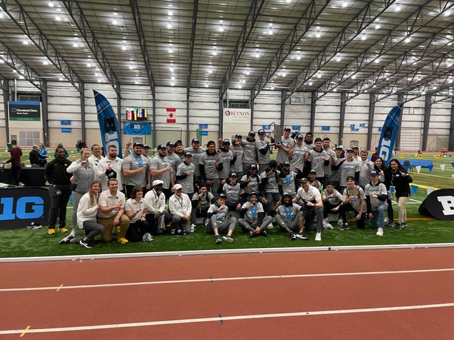 The Iowa men's track team took a very similar picture last year, as they posed Saturday for a championship photo in Geneva, Ohio, after winning the Big Ten indoors.