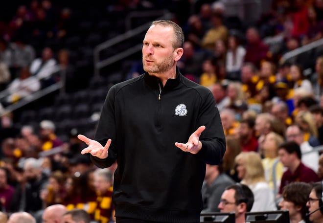 Mar 6, 2022; St. Louis, MO, USA;  Drake Bulldogs head coach Darian DeVries reacts to a call against the Loyola Ramblers during the first half in the finals of the Missouri Valley Conference Tournament at Enterprise Center. Mandatory Credit: Jeff Curry-USA TODAY Sports