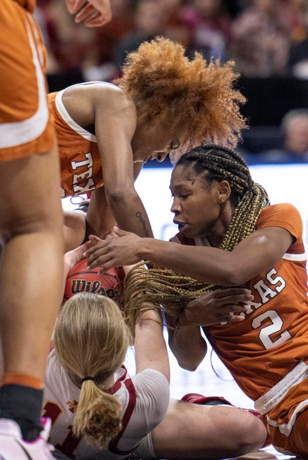 Mar 12, 2022; Kansas City, MO, USA; Texas Longhorns guard Rori Harmon (3) and Texas Longhorns guard Aliyah Matharu (2) fight for possession with Iowa State Cyclones guard Emily Ryan (11) in the first half at Municipal Auditorium. Mandatory Credit: Amy Kontras-USA TODAY Sports