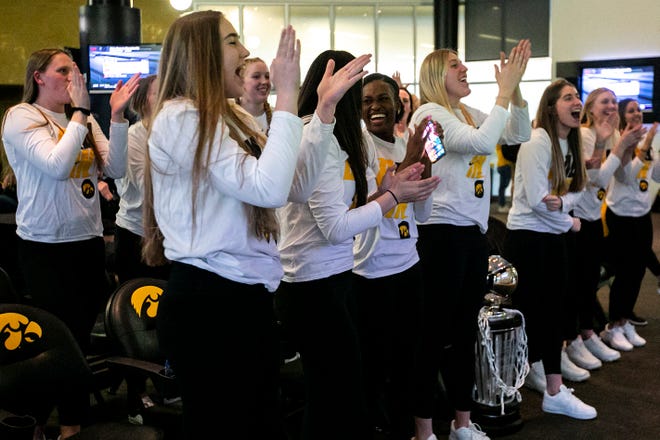 Iowa women's basketball players celebrate at a NCAA Tournament Selection Sunday watch party, Sunday, March 13, 2022, at Carver-Hawkeye Arena in Iowa City, Iowa.
