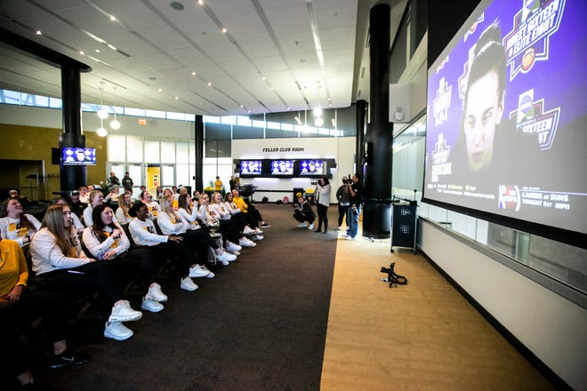 Iowa women's basketball players celebrate at a NCAA Tournament Selection Sunday watch party, Sunday, March 13, 2022, at Carver-Hawkeye Arena in Iowa City, Iowa.