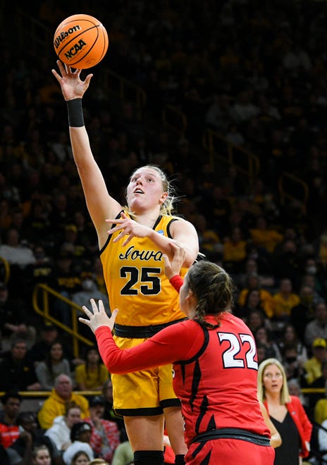 Iowa's forward Monika Czinano (25) goes up for a shot against Illinois State's forward Chloe Van Zeeland (22) during the opening round of the Women's NCAA Basketball Tournament at Carver-Hawkeye Arena Friday, March 18, 2022, in Iowa City.