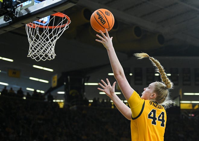Iowa's forward Addison O'Grady (44) goes up for a shot against Illinois State during the opening round of the Women's NCAA Basketball Tournament at Carver-Hawkeye Arena Friday, March 18, 2022, in Iowa City.