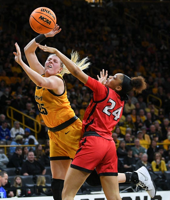 Iowa's forward Monika Czinano (25) goes up for a shot against Illinois State's forward DeAnna Wilson (24) during the opening round of the Women's NCAA Basketball Tournament at Carver-Hawkeye Arena Friday, March 18, 2022, in Iowa City.