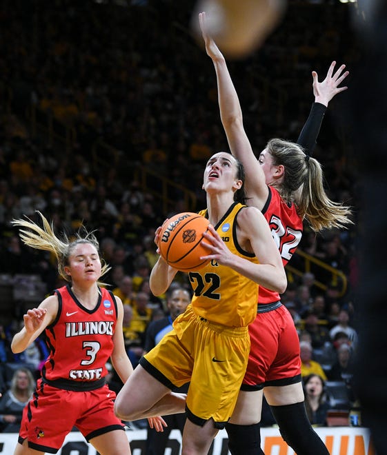 Iowa's guard Caitlin Clark (22) goes up for a shot against Illinois State's forward Kate Bullman (32) during the opening round of the Women's NCAA Basketball Tournament at Carver-Hawkeye Arena Friday, March 18, 2022, in Iowa City.