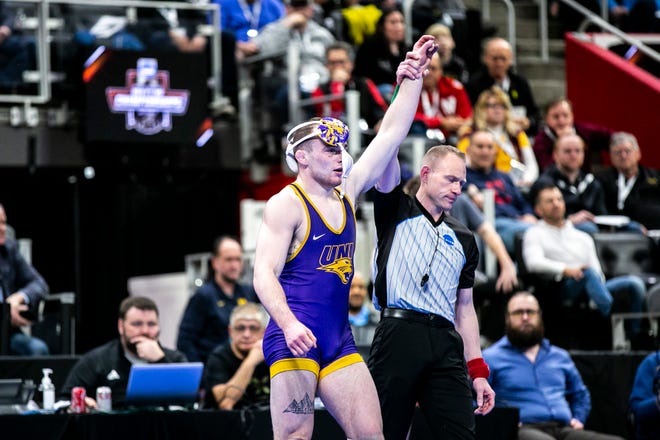 Northern Iowa's Parker Keckeisen has his hand raised after scoring a decision at 184 pounds for third place during the fifth session of the NCAA Division I Wrestling Championships, Saturday, March 19, 2022, at Little Caesars Arena in Detroit, Mich.