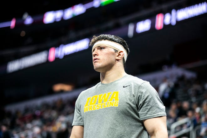 Iowa's Tony Cassioppi is introduced before wrestling at 285 pounds during the fifth session of the NCAA Division I Wrestling Championships, Saturday, March 19, 2022, at Little Caesars Arena in Detroit, Mich.