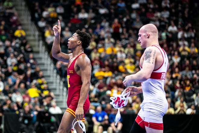 Iowa State's David Carr, left, reacts after scoring a decision against Nebraska's Peyton Robb at 157 pounds for third place during the fifth session of the NCAA Division I Wrestling Championships, Saturday, March 19, 2022, at Little Caesars Arena in Detroit, Mich.
