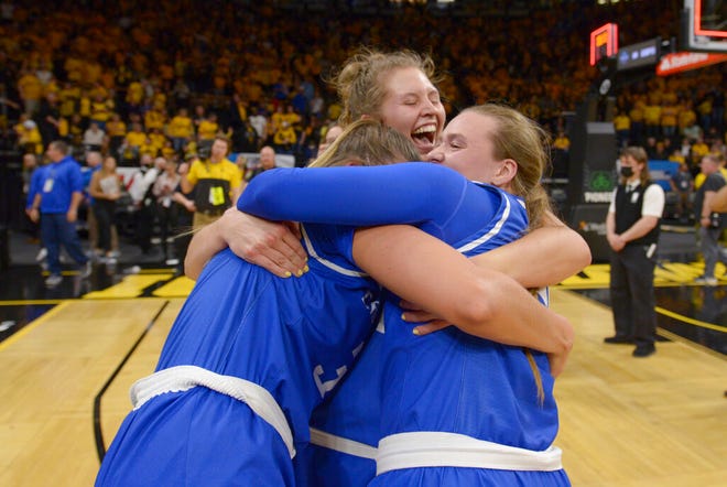 Creighton players celebrate their team's 64-62 over Iowa during a second-round game in the NCAA women's college basketball tournament, Sunday, March 20, 2022, in Iowa City, Iowa. (AP Photo/Ron Johnson)
