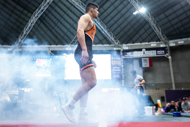 Hunter Garvin is introduced before wrestling at 152 pounds in the finals during the USA Wrestling High School National Recruiting Showcase, Saturday, April 2, 2022, at the UNI-Dome in Cedar Falls, Iowa.
