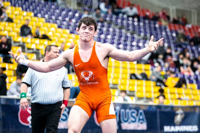 Wyatt Voelker reacts after scoring a fall at 195 pounds in the finals during the USA Wrestling High School National Recruiting Showcase, Saturday, April 2, 2022, at the UNI-Dome in Cedar Falls, Iowa.