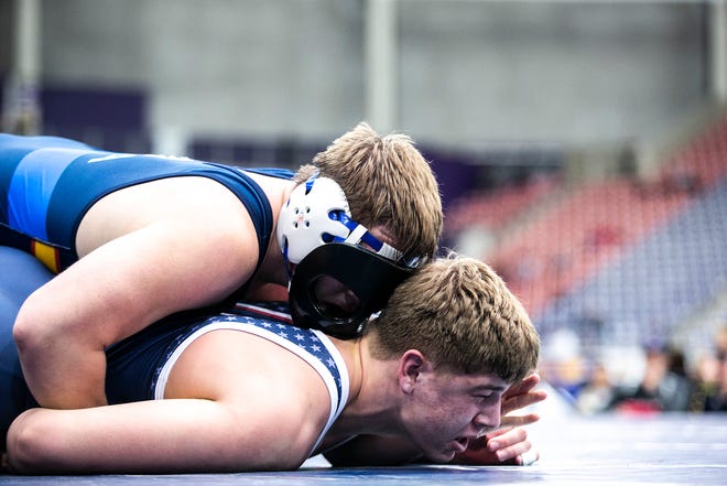 Jared Thiry, top, wrestles Vincent Mueller at 220 pounds in the finals during the USA Wrestling High School National Recruiting Showcase, Saturday, April 2, 2022, at the UNI-Dome in Cedar Falls, Iowa.