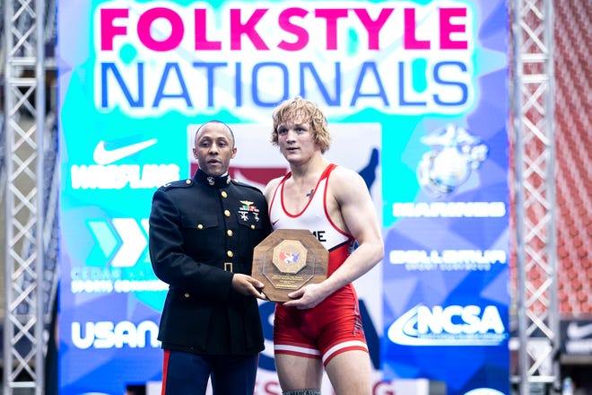 Tate Naaktgeboren poses for a photo with his trophy after scoring a decision at 182 pounds in the finals during the USA Wrestling High School National Recruiting Showcase, Saturday, April 2, 2022, at the UNI-Dome in Cedar Falls, Iowa.