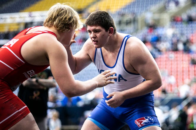 Wyatt Smith, right, wrestles Paul Clark at 285 pounds in the open finals during the USA Wrestling High School National Recruiting Showcase, Saturday, April 2, 2022, at the UNI-Dome in Cedar Falls, Iowa.