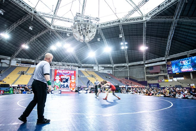 Tate Naaktgeboren, right, wrestles Aeoden Sinclair in the finals at 182 pounds during the USA Wrestling High School Recruiting Showcase, Saturday, April 2, 2022, at the UNI-Dome in Cedar Falls, Iowa.