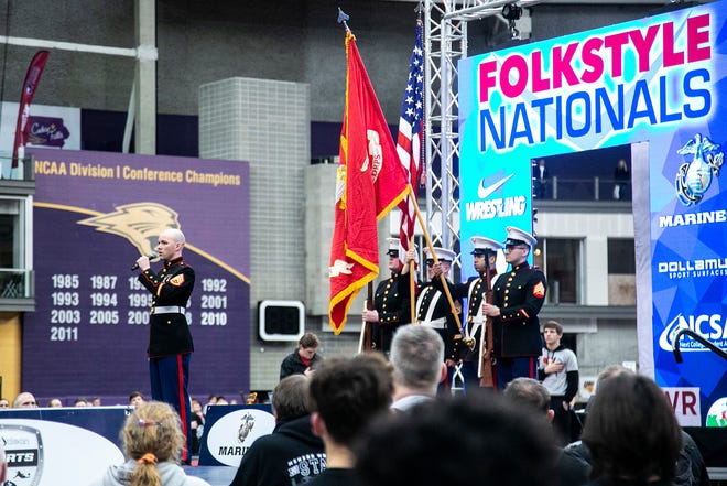 The national anthem is performed in the finals during the USA Wrestling High School Recruiting Showcase, Saturday, April 2, 2022, at the UNI-Dome in Cedar Falls, Iowa.