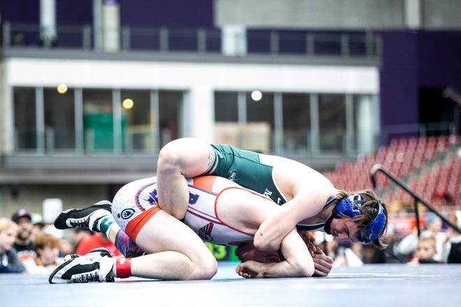 Max Magayna, top, wrestles at 160 pounds in the finals during the USA Wrestling High School National Recruiting Showcase, Saturday, April 2, 2022, at the UNI-Dome in Cedar Falls, Iowa.