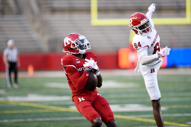 Rutgers football Scarlet-White Game at SHI Stadium on Friday, April 22, 2022. S #7 Robert Longerbeam makes an interception on a pass intended for W #84 Ahmirr Robinson.