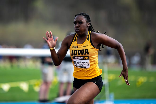 Iowa's Mytika Mayberry competes in the 100 meter dash during the Musco Twilight NCAA outdoor track and field meet, Saturday, April 23, 2022, at Francis X. Cretzmeyer Track in Iowa City, Iowa.