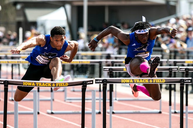 Iowa Western's Michael Buchanan, right, and Cortney Watkins compete in the 100 meter hurdles during the Musco Twilight NCAA outdoor track and field meet, Saturday, April 23, 2022, at Francis X. Cretzmeyer Track in Iowa City, Iowa.